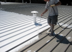 Spray-Application-of-White-Acrylic-Elastomeric-Coating-System-to-Metal-Roof-in-Winston-Salem-NC