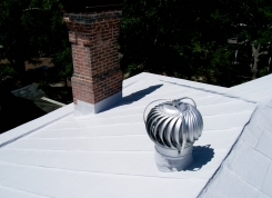 White-Acrylic-Elastomeric-Coating-System-Applied-to-Historical-Home-to-Stop-Leaks-to-this-Metal-Roof-in-Wilmington-NC