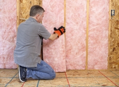 Man Installing Insulation